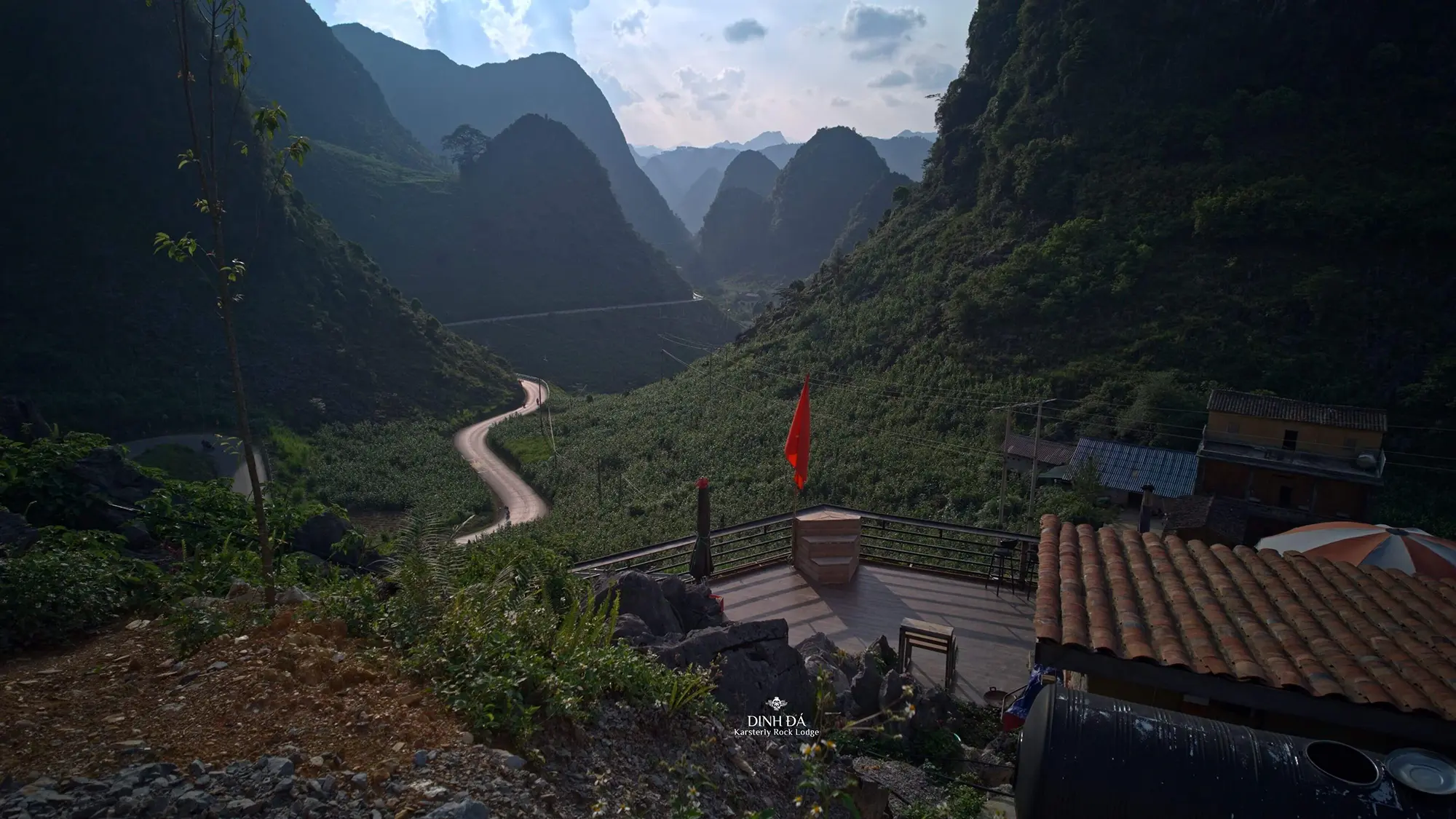 Mountain views and the road winding between the hills